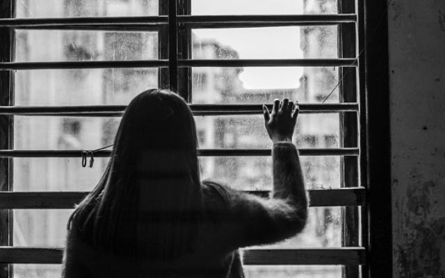 sad woman in a room