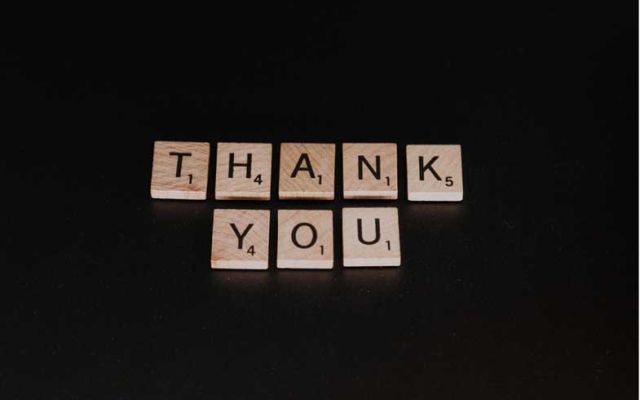 thank you written with scrabble pieces