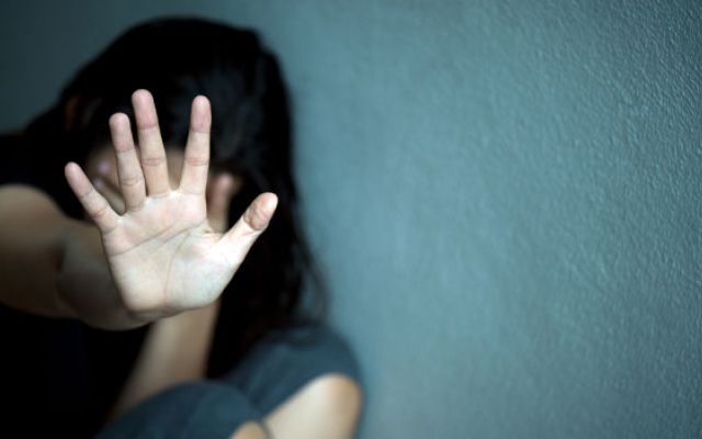 Woman with her face covered