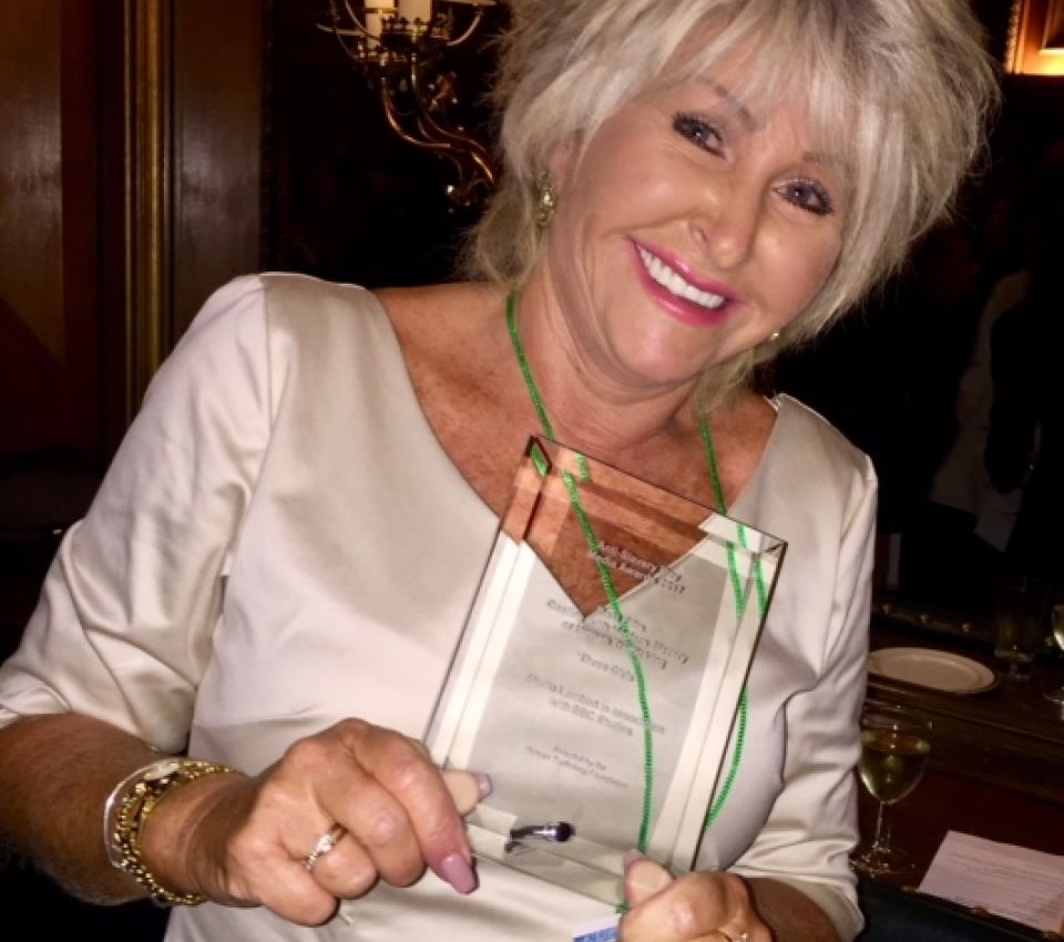Maggie with the award for ‘Best Anti-slavery Programme’ in 2017, in Speaker’s Corner (HoP)