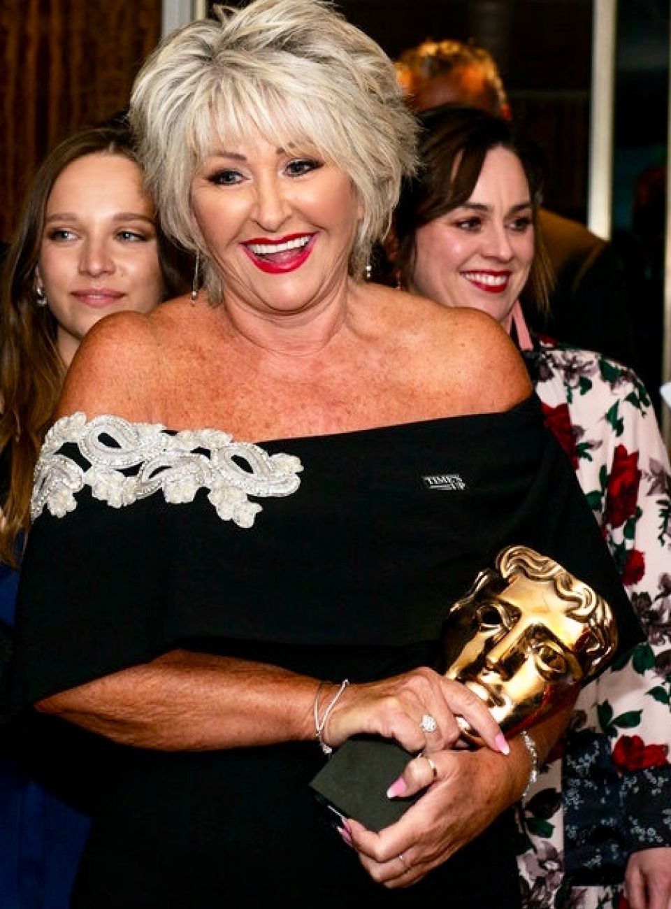 Maggie holding on of the Bafta ​  Awards for the BBC Multi award ​  winning Drama ‘Three Girls’