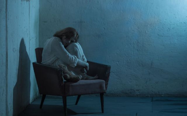Girl sitting in a chair